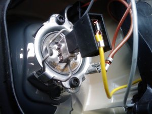 Remove ford focus headlight bulb #8